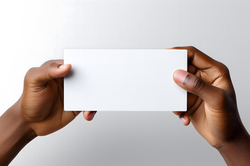 hand holding blank business card mock up