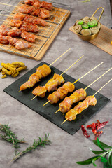 Shish tawook with curry over charcoal, grill the shish tawook 3