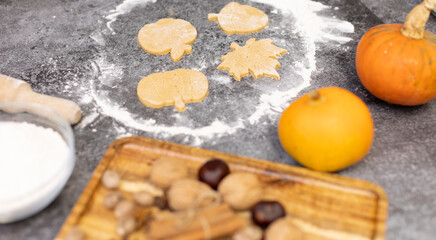 Cookies in the form of leaves and pumpkins from dough for a holiday for adults and children....