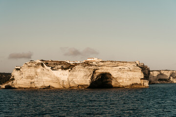 Cliffside views of coastal marina town in Corsica France