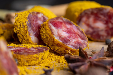 Sliced beef salami with spices and lots of turmeric