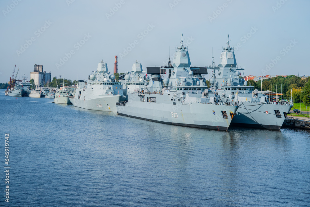 Wall mural german navy warship fleet parked at nato port in riga, latvia