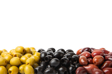 Green, black and red olives isolated on white background. Various types of olives and with fresh olive leaves. Mediterranean food. Vegan.