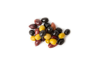Green, black and red olives isolated on white background. Various types of olives and with fresh olive leaves. Mediterranean food. Vegan.