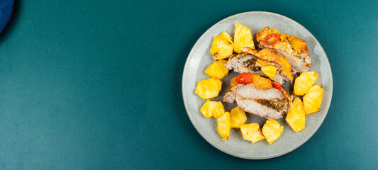 Pork meat fried with pineapple, space for text.