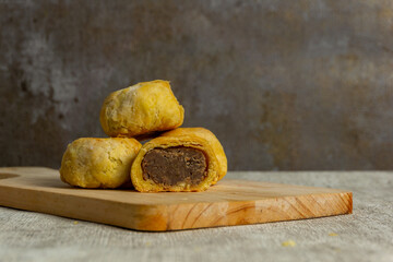 Indonesian delicious pastry called bakpia or kue kacang. Cake filled with sweet mung bean.