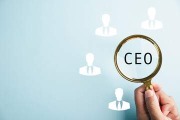 HR officer seeks leader and CEO. HR manager selects employee. Leader stands out from crowd. Looking for a good worker. HR, HRM, HRD. Magnifying glass magnifies CEO text.