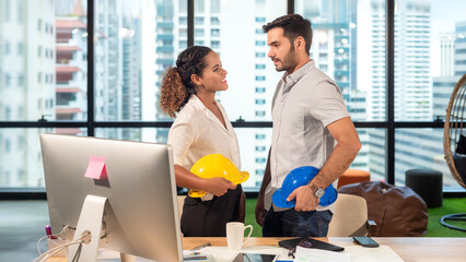 Fototapeta premium Business engineer partner woman and businessman standby together for start up new Project outdoor modern office. City background. Teamwork and Business Concept