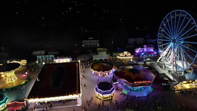 Bavarian Volksfest impressions at night in top view 
