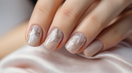 Delicate nude beige manicure on short nails.