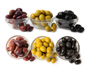 Green, black and red olives isolated on white background. Various types of olives and with fresh...