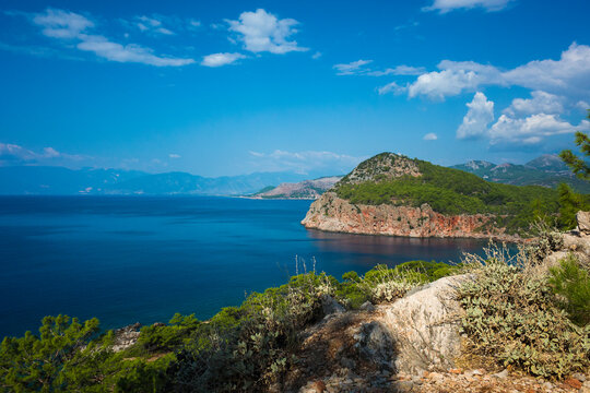Mediterranean sea coast Picturesque nature of south Turkey, Mountains cliff into deep blue sea water, Sunny day