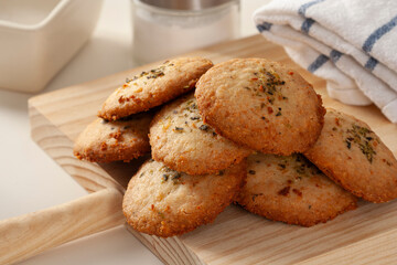 Salty crackers with aromatic herbs. Healthy snack.
