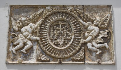 Traditional Catholic stone carved design on a grave at the Recoleta Cemetery in Buenos Aires, Argentina