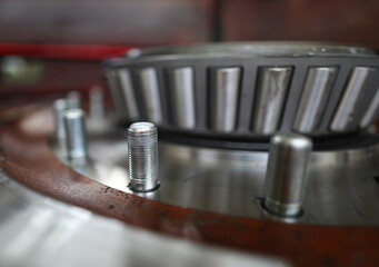 Iron hardware with bearing and bolts closeup view