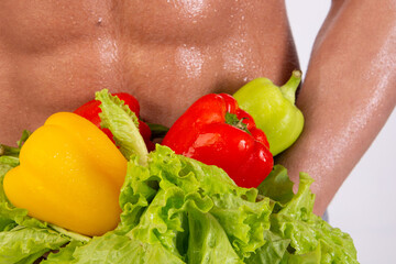 Diet, sport and healthy lifestyle. A guy with a beautiful body. Proper nutrition and sports...