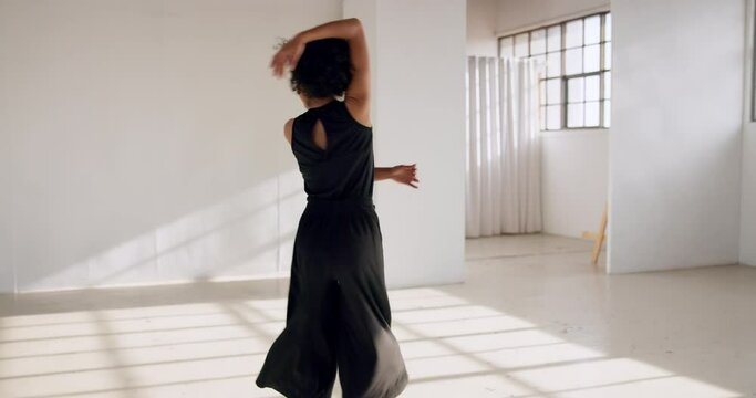 Dance, performance and woman in creative practice of choreography and training in ballet academy, studio or class. African, dancer or freedom of movement, dancing or artist workout with body spinning