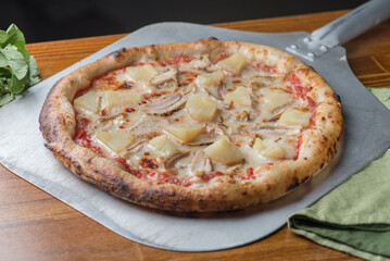 Pizza with chicken and pineapple. Hawaiian pizza