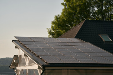 Sustainable Modern House with Solar Panels. A Beautiful Blend of Style and Renewable Energy. House...