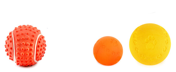 Bright dog balls isolated on white background. Wide photo. Free space for text. Collage.