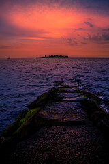 Milford Connecticut Sunset Seascape over the jetty at Silver Sands State Park, Charles Island view on Long Island Sound Beach