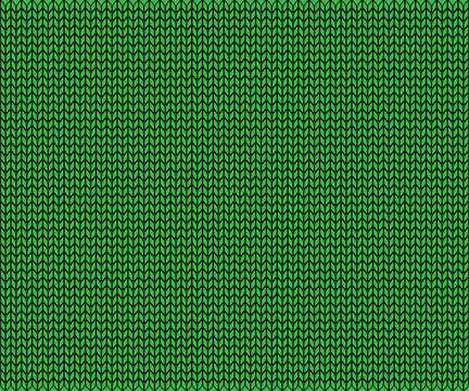 winter Christmas background in the texture of a warm green knitted sweater