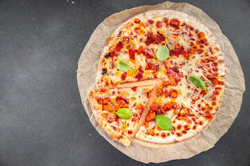 pizza thin dough wood-fired oven, meat, bacon, cheese Cooking appetizer meal food snack on the table