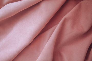 Folds of pink fabric