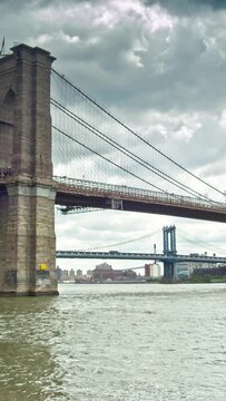 Brooklyn Bridge, New York City, stormy clouds, vertical background, social media story