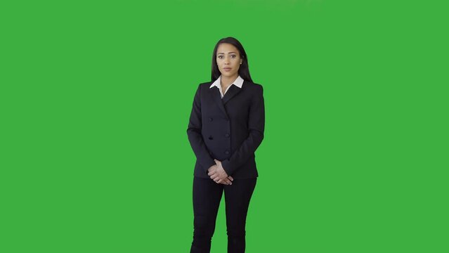 Portrait of Young Woman in Suit Isolated on Green Screen Background