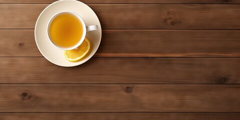 Morning bliss. Enjoying hot lemon juice in cup in rustic Setting on wooden table on vintage background top view