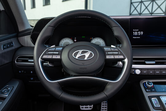Novosibirsk/ Russia – September 08 2023:   Hyundai Palisade, car Interior  steering wheel with  logo    and  speedometer and tachometer