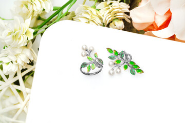 Elegant jewelry set. Jewellery set with gemstones. Jewelry accessories collage. Product still life...