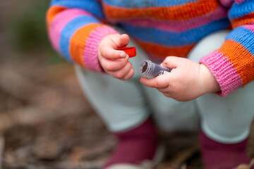 kid with test tube on farm