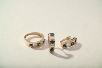 Elegant jewelry set. Jewellery set with gemstones. Jewelry accessories collage. Product still life...