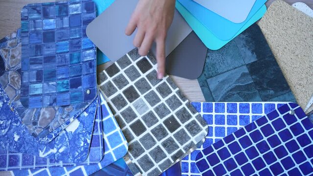 Top view choosing PVC film for swimming pools from many samples