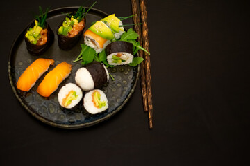 Luxurious and creative Sushi as Nigiri,Futomaki,Uramaki with chopsticks and Soja