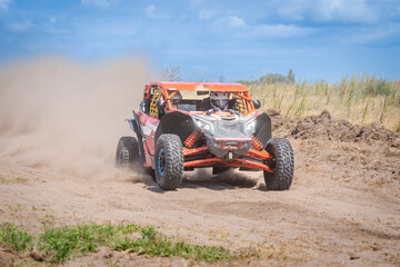 Fototapeta premium UTV buggy offroad vehicle racing on sand. Extreme, adrenalin. 4x4.