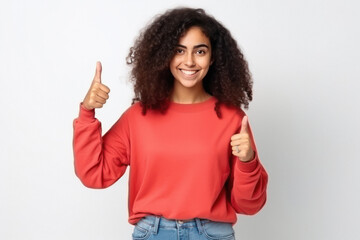 young woman showing thumps up on white background