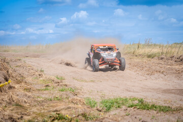 Obraz premium Amazing view on sandy active UTV. Extreme ride on 4x4