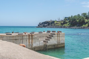 the sea and the stairs - obrazy, fototapety, plakaty