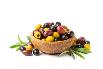 Green, black and red olives isolated on white background. Various types of olives and with fresh olive leaves. Mediterranean food. Vegan.
