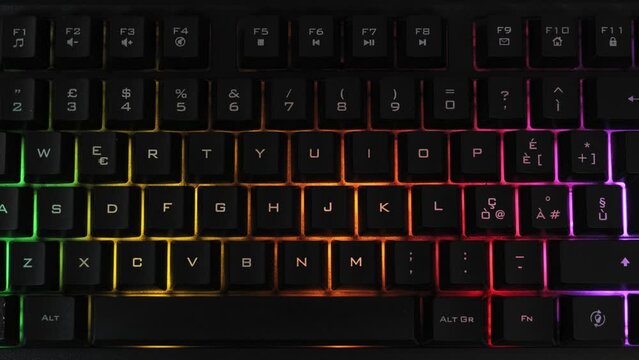Modern backlit keyboard with pulsating rgb colour light.