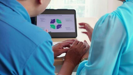 Young asian woman counseling to elderly couple husband and wife about insurance life for planning in living room at home, insurance life agent or consultant explaining with senior for decisions.