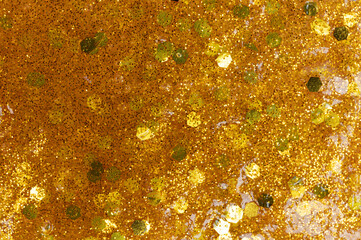 Surface of gold shiny color slime