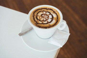 Nice Texture of Latte art on hot latte coffee. Art from professional barista artist