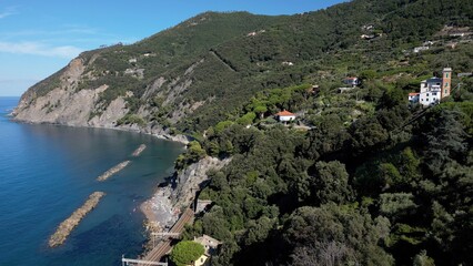Fototapeta na wymiar Europe, Italy, Framura is a little sea village in Liguria close to 5 terre ( five island ) - drone aerial view of mediterranean coast - natural harbour and beach 
