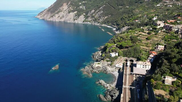 Europe, Italy, Framura is a little sea village in Liguria close to 5 terre ( five island )  - drone aerial view of mediterranean coast - natural harbour and beach 