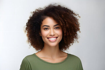 Beautiful young smiling afroamerican woman with curly hair portrait