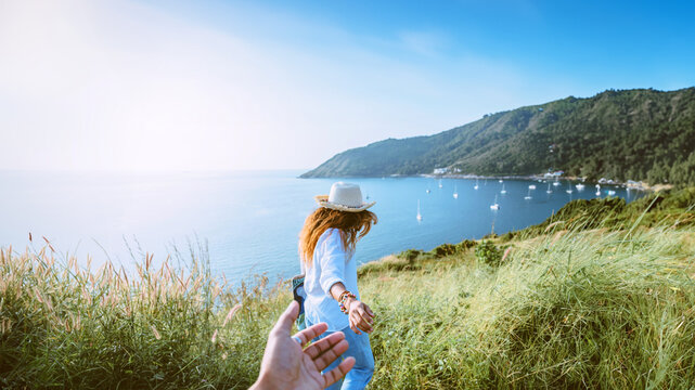 Asian lover couple woman and man travel nature. Travel relax. sea In the summer. Promthep Cape, Phuket Thailand.